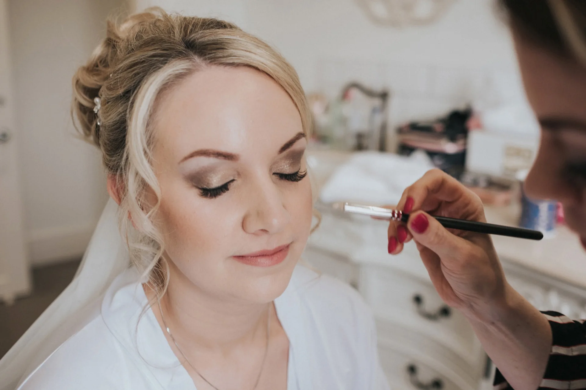 Bridal eye makeup being applied on the wedding morning — wedding makeup artist Jade Victoria, Berkshire